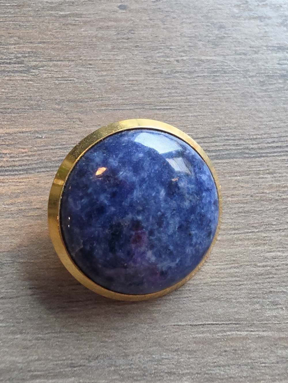 Gold-Tone Brooch with Round Blue cabochon